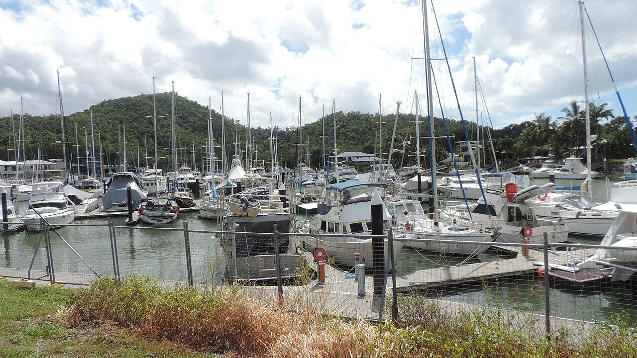 Marina fairway with vessels berthed either side