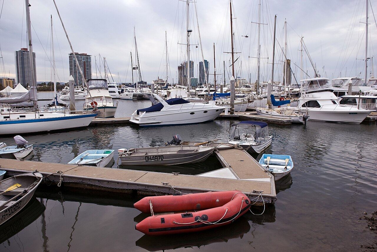 Tenders and leisure boats on marina berths